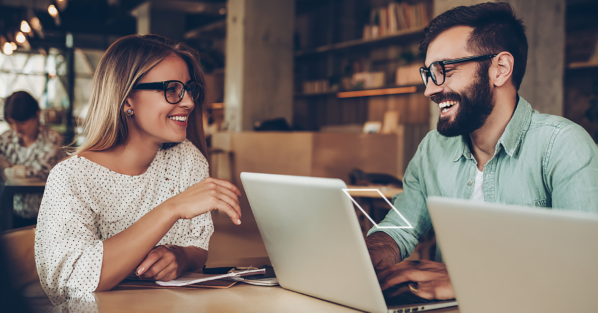 where is domain co. two people working in the office